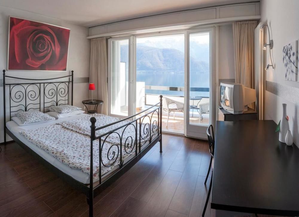 Hotel Garni Battello Мелиде Екстериор снимка